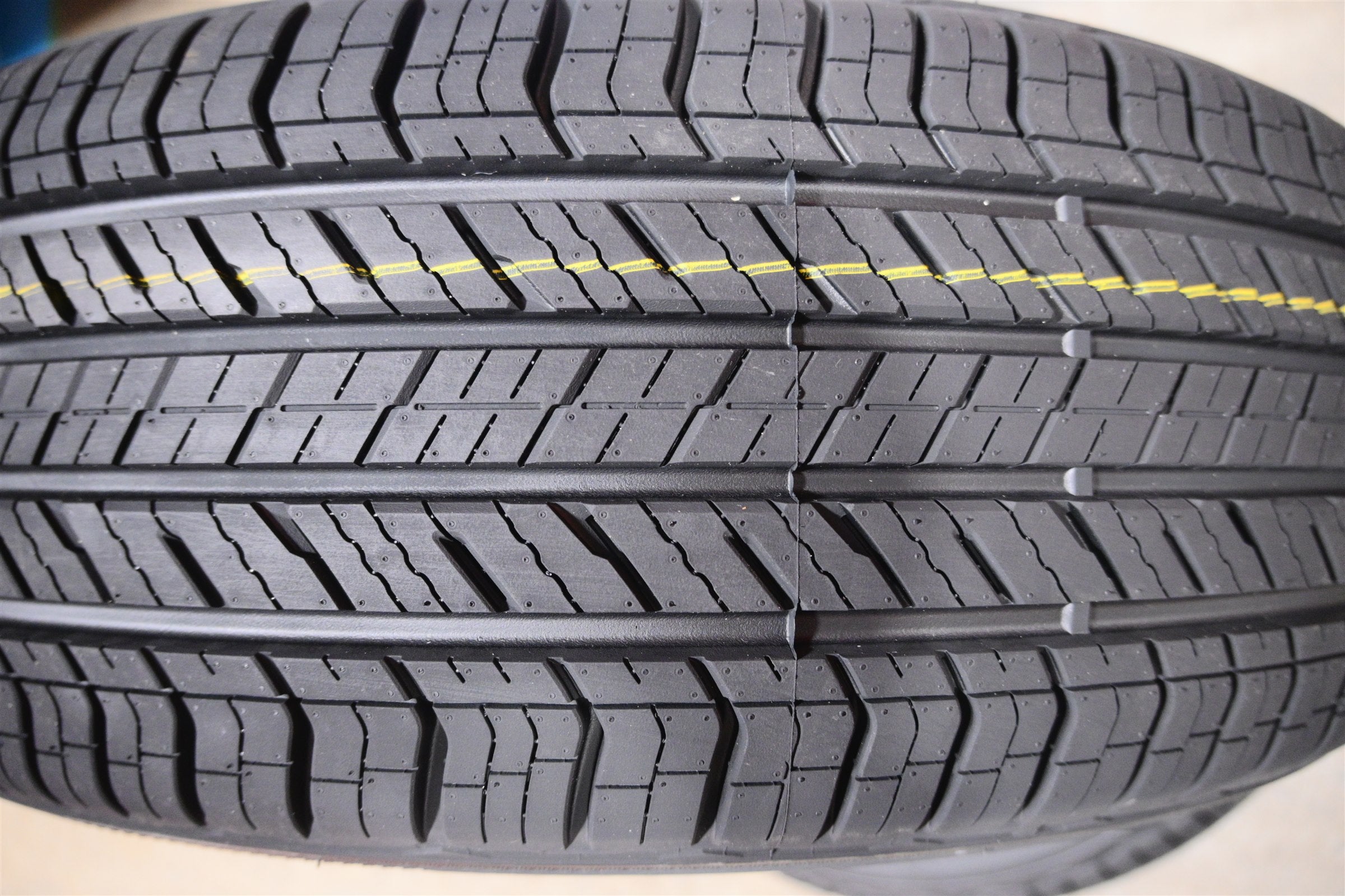 Actual new all-season tire tread photographed in Markham